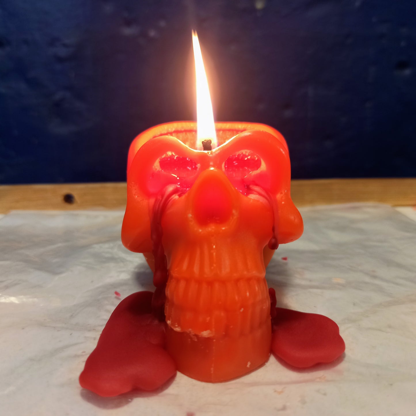 Orange bleeding skull candle for spell 3.15in height