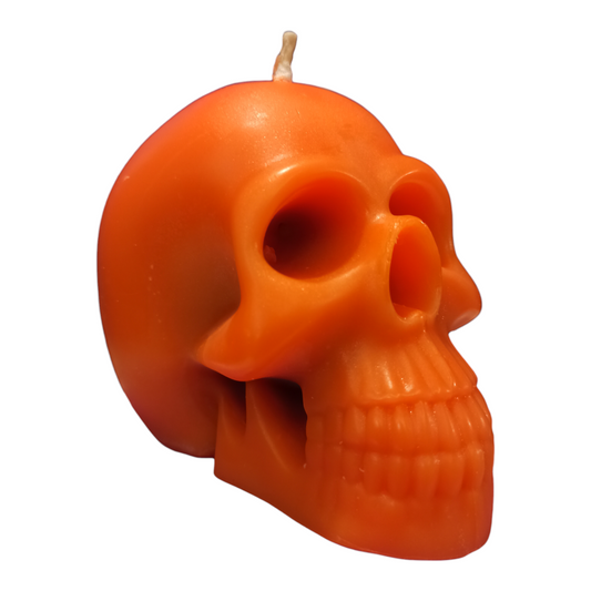 Orange bleeding skull candle for spell 3.15in height